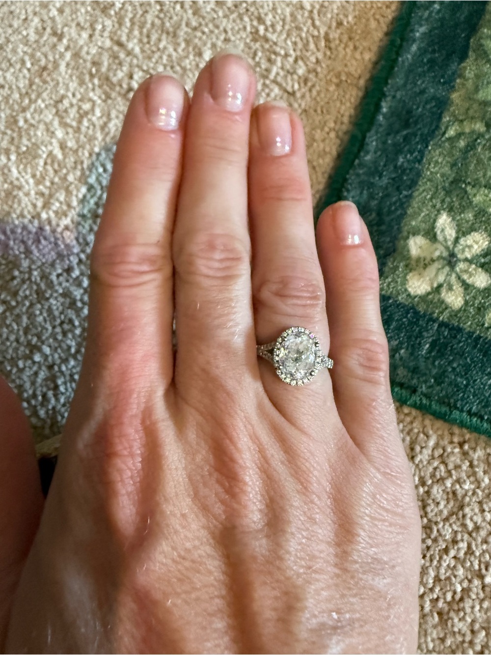 Portuguese cut oval moissanite ring